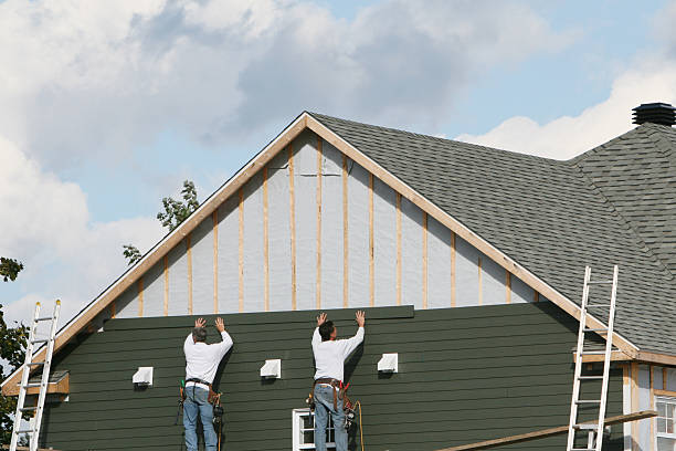Professional Emergency Siding Repair technician working in Mason, TN